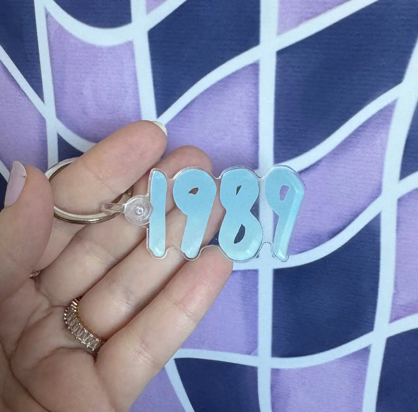 1989 blue acrylic keychain MangoIllustrated