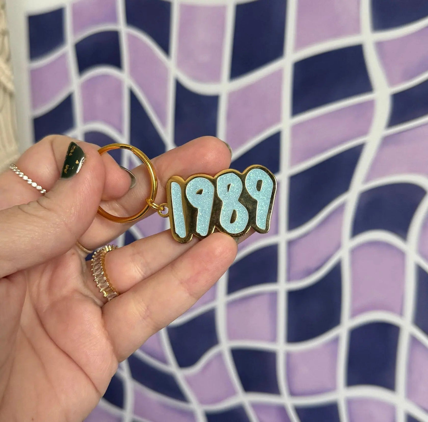 1989 blue glitter enamel keychain - MangoIllustrated - Accessories