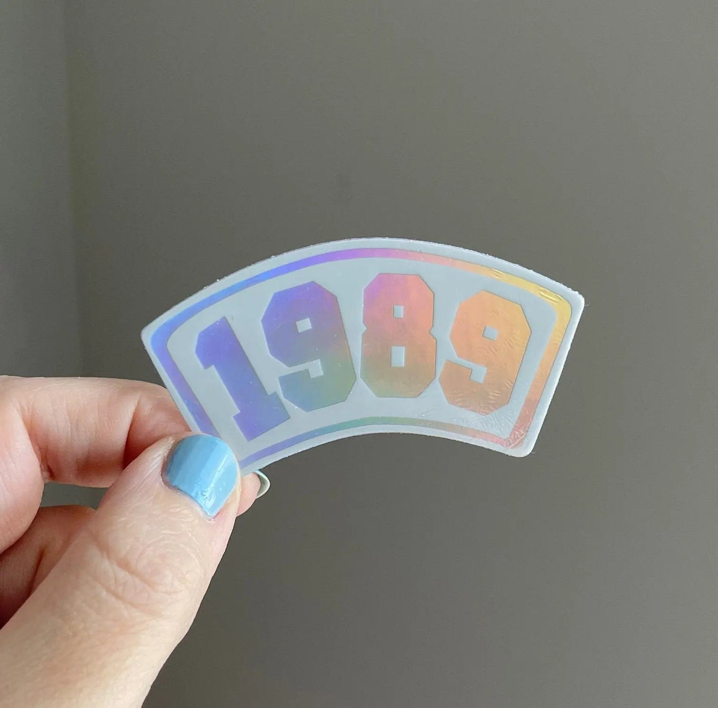 1989 Collegiate white holographic sticker - MangoIllustrated - Sticker