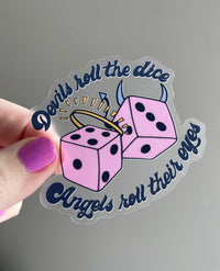 CLEAR Devils roll the dice Angels roll their eyes sticker MangoIllustrated