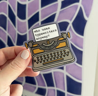 CLEAR Who uses typewriters anyway sticker MangoIllustrated