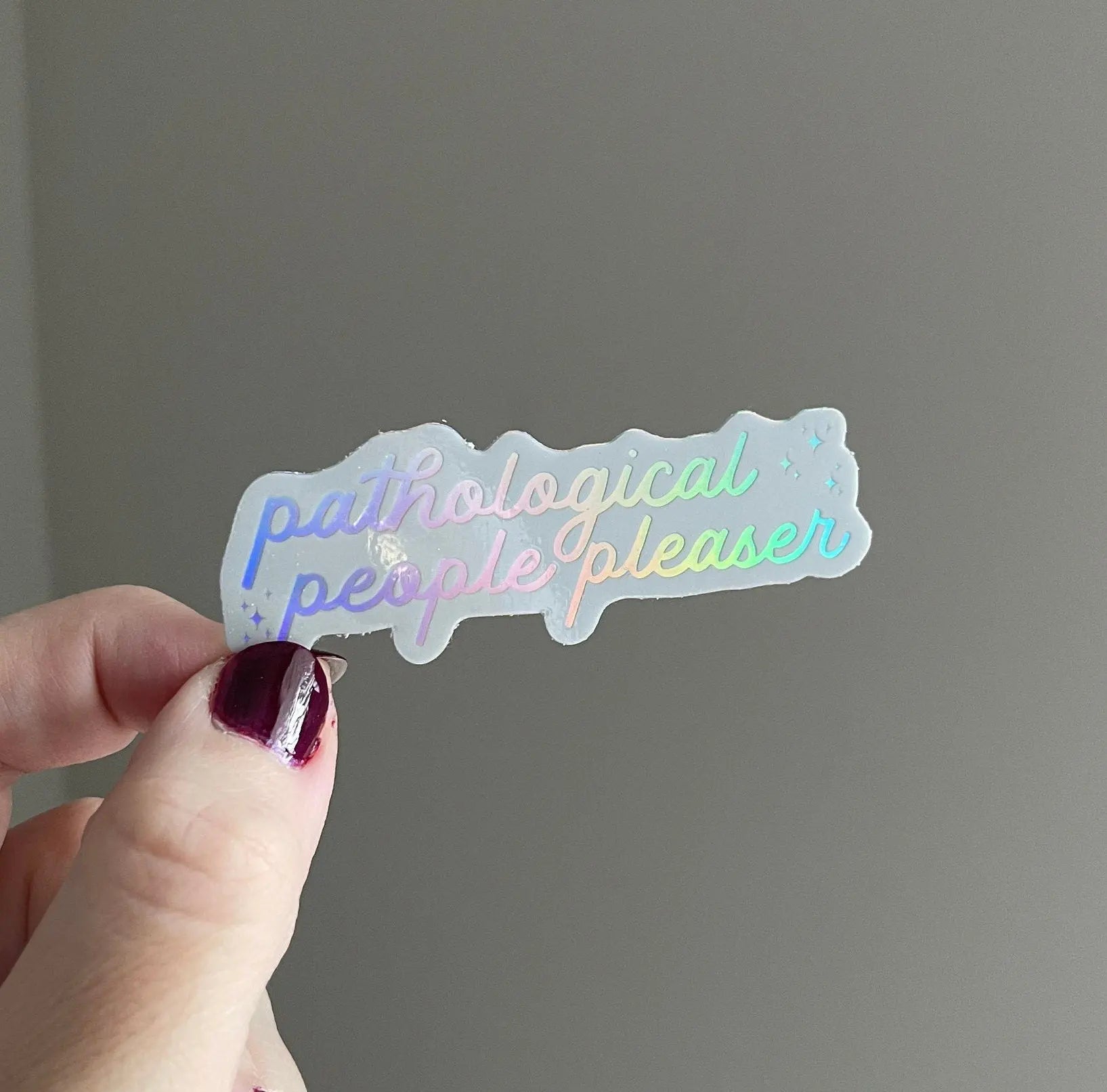 Holographic Pathological people pleaser sticker MangoIllustrated