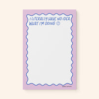 Literally No Idea What I'm Doing notepad flat lay — funny office notepad by indie artist MangoIllustrated