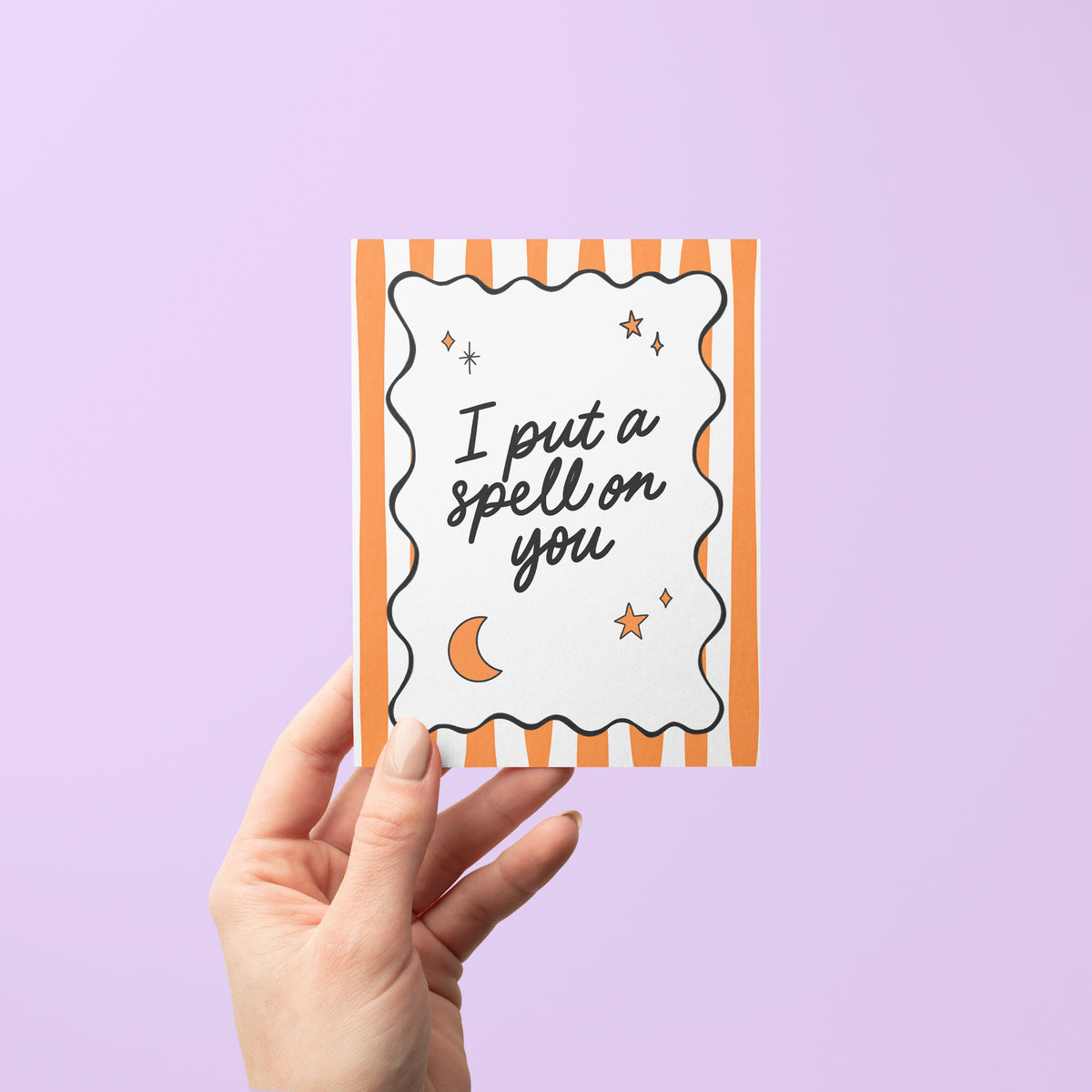 I Put a Spell On You Halloween Card flat lay with A2 kraft envelope — by indie artist MangoIllustrated