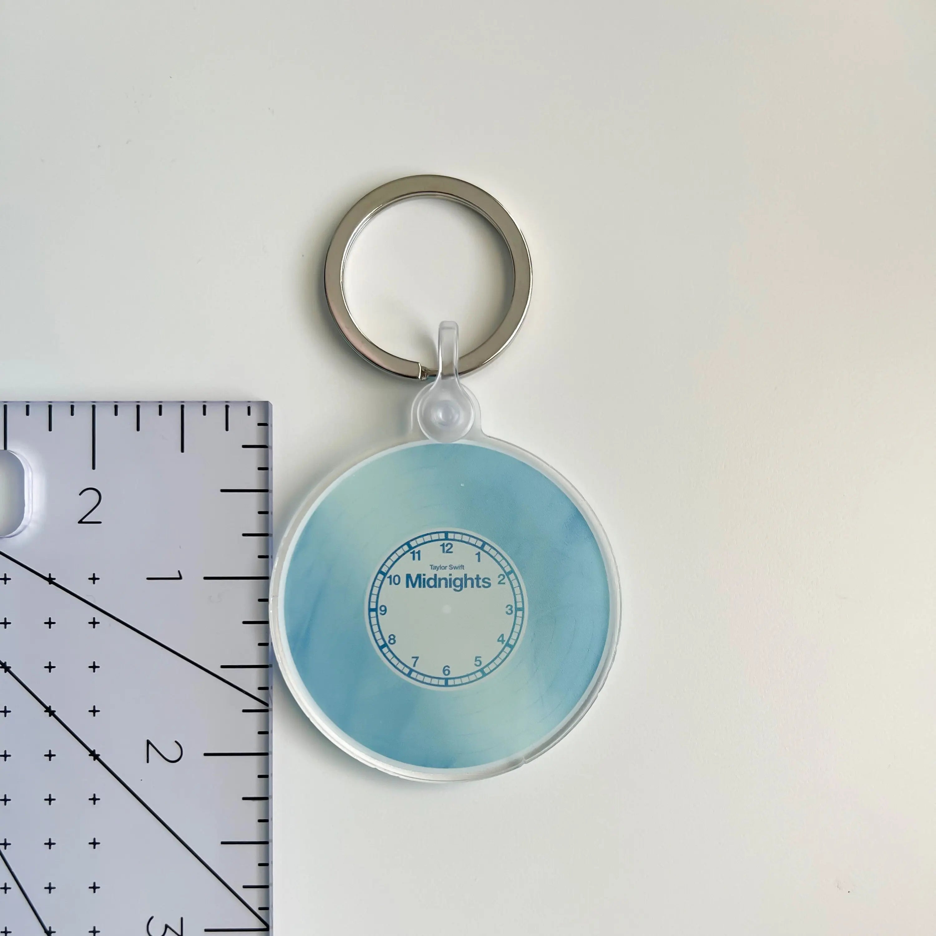 Midnights Moonstone Blue record acrylic keychain MangoIllustrated