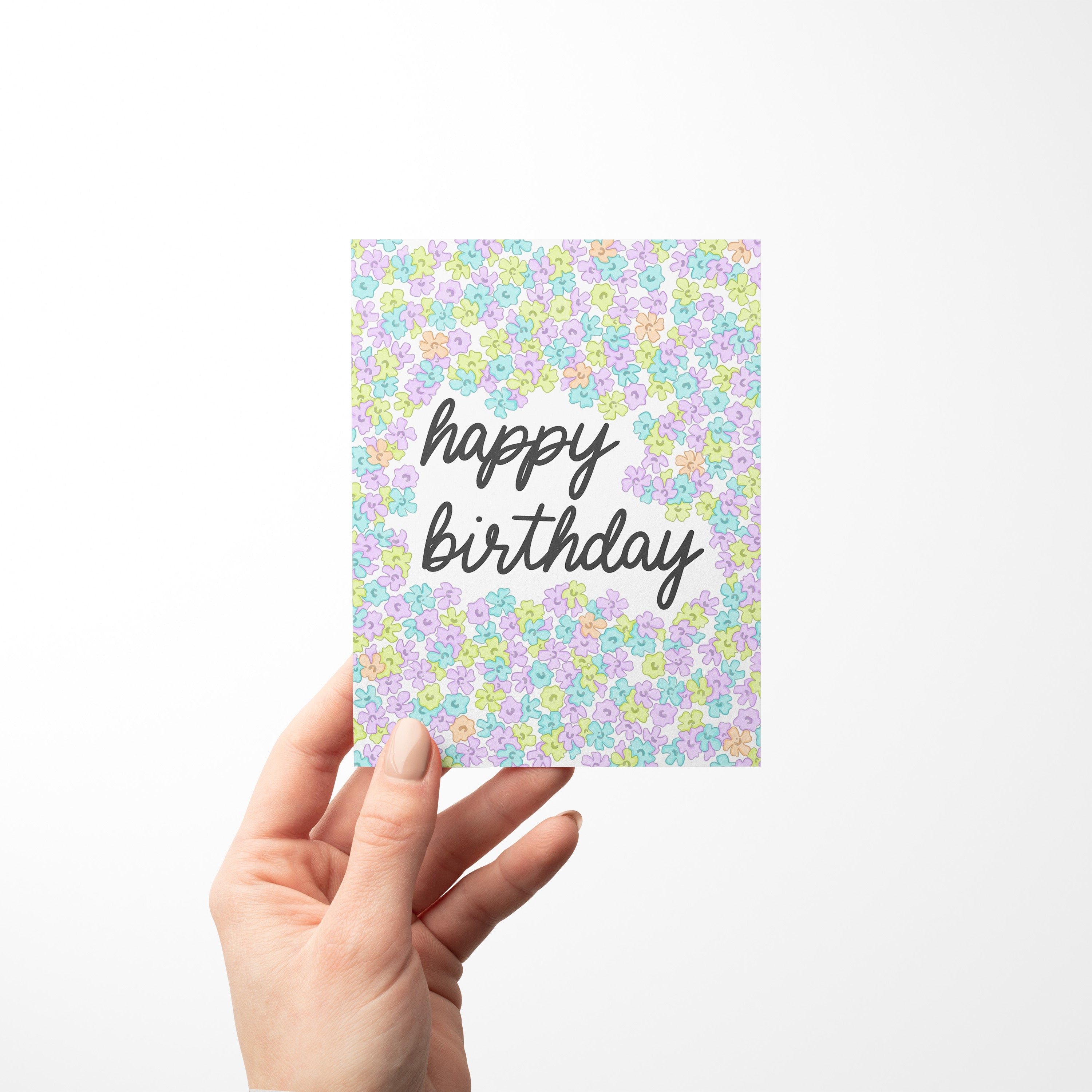 neon floral birthday card—featuring hand-lettered script and bold purple, blue, and green flower doodles.