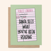 Santa Sees What Youve Been Reading card styled — illustrated holiday card for book lovers by MangoIllustrated