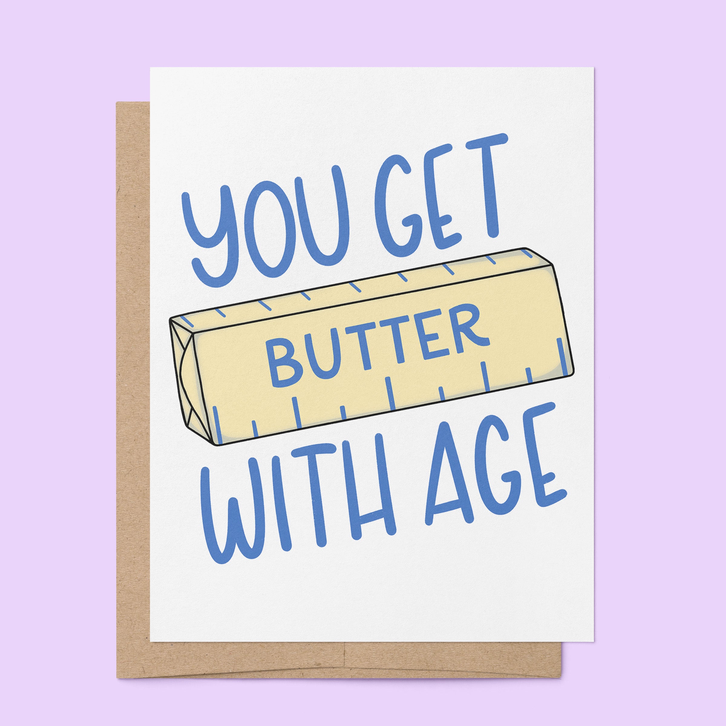 You Get Butter With Age birthday card flat lay — funny food pun card by indie artist MangoIllustrated