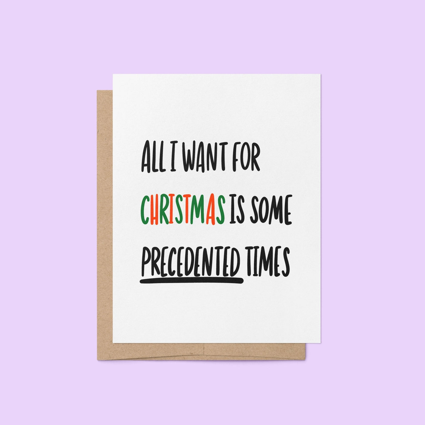 Holiday greeting card with bold black text reading “All I Want For Christmas is Some Precedented Times,” with "Christmas" in festive red and green letters.