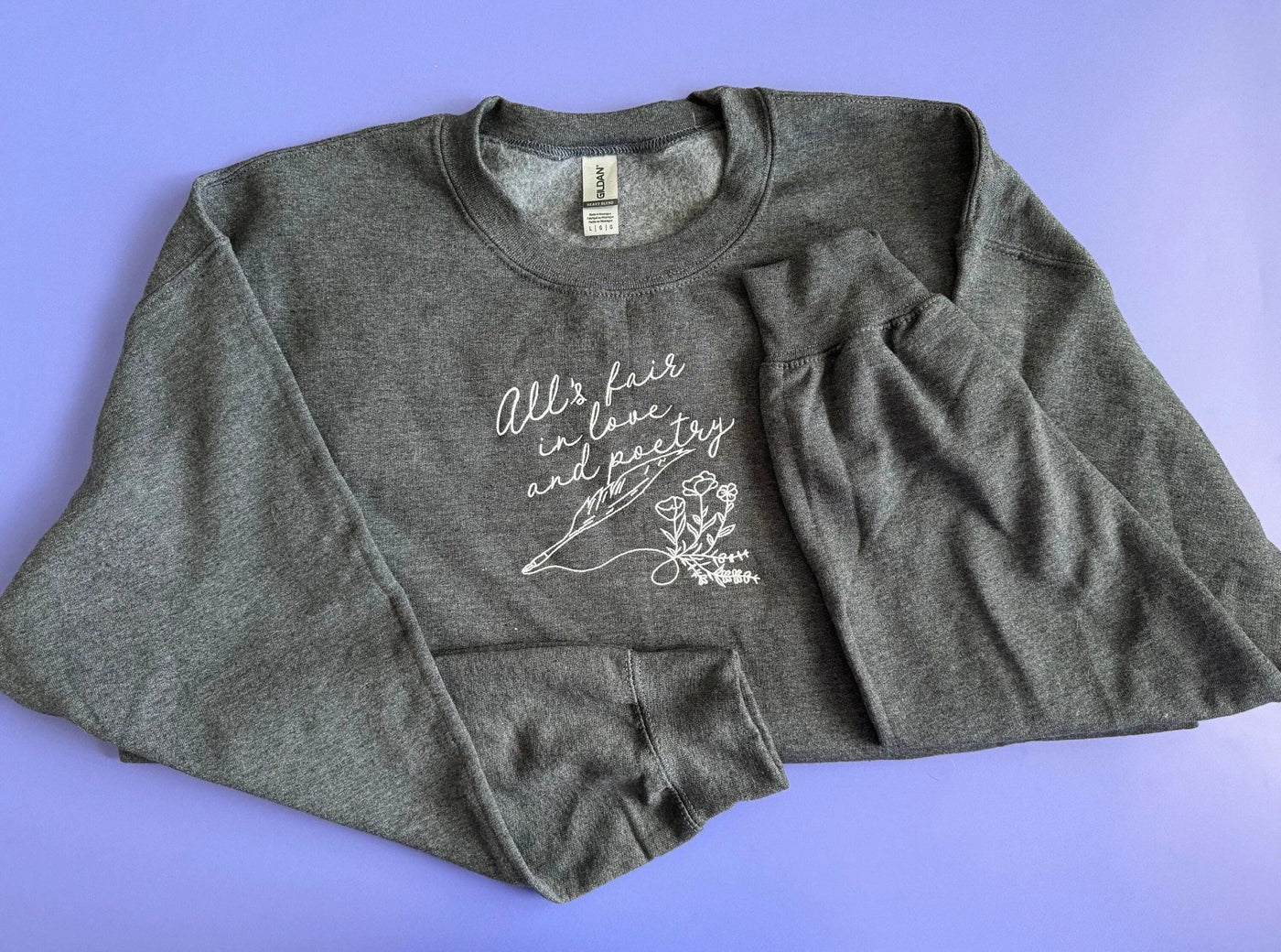 All's Fair in Love and Poetry embroidered sweatshirt - MangoIllustrated - Apparel