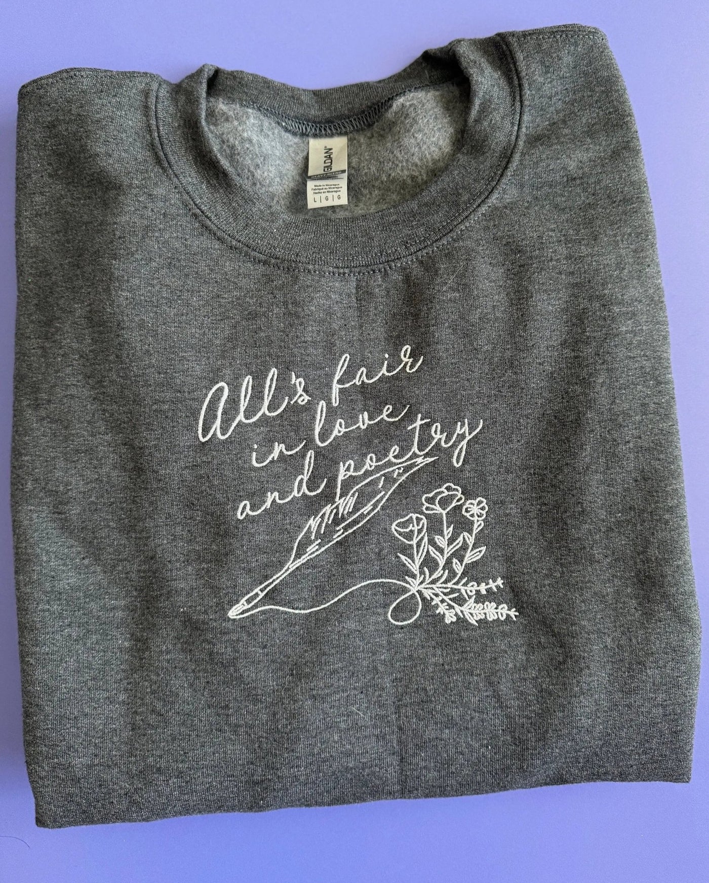 All's Fair in Love and Poetry embroidered sweatshirt - MangoIllustrated - Apparel