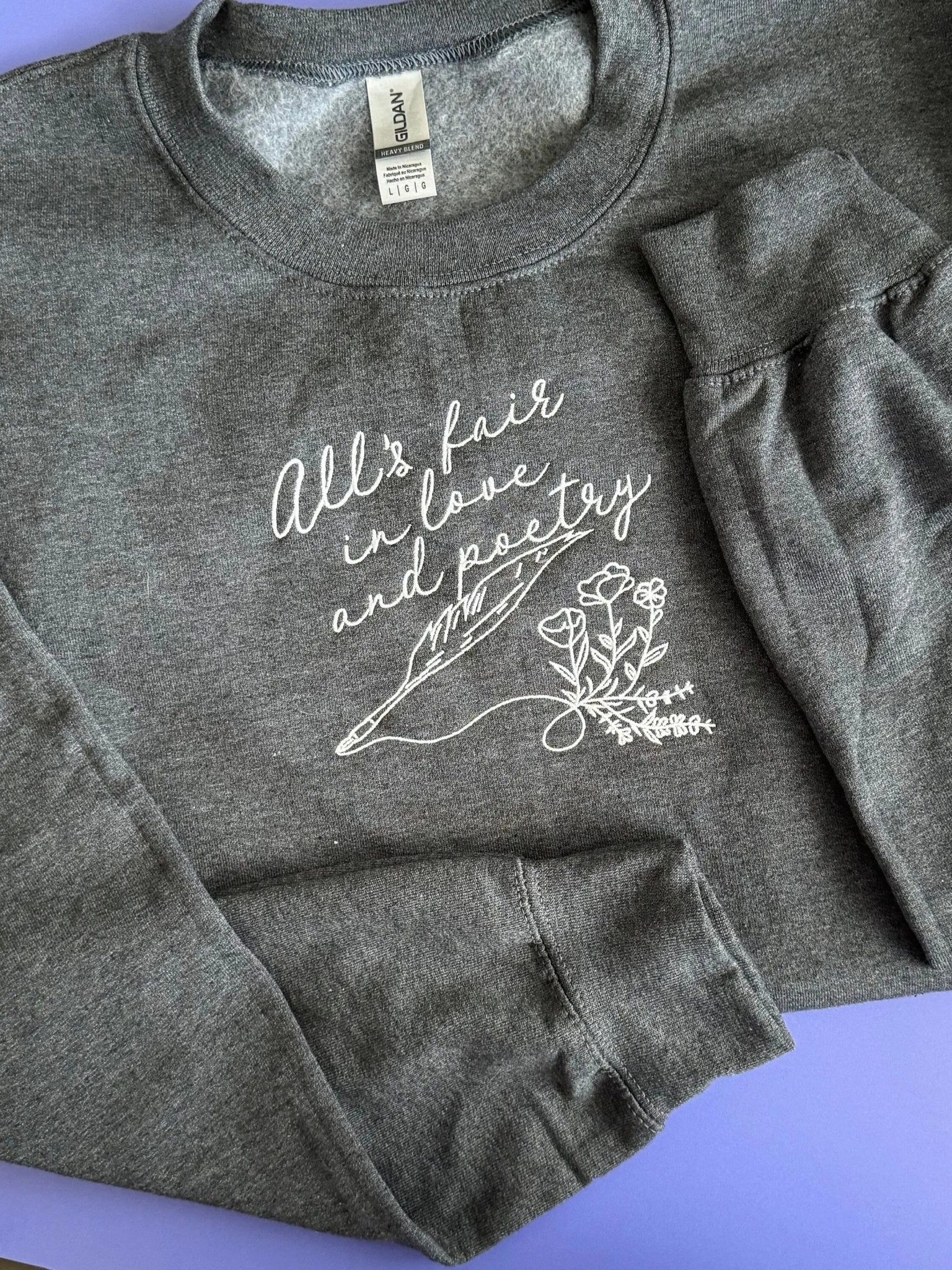 All's Fair in Love and Poetry embroidered sweatshirt - MangoIllustrated - Apparel