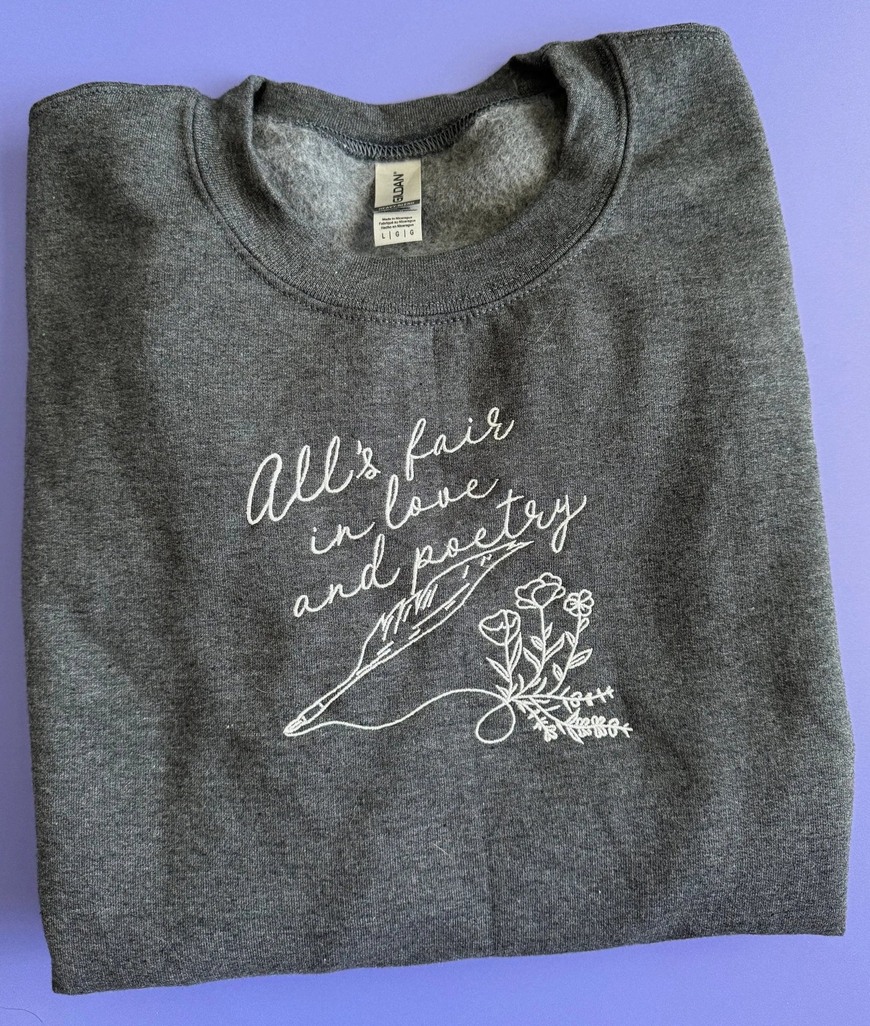 All's Fair in Love and Poetry embroidered sweatshirt - MangoIllustrated - Apparel