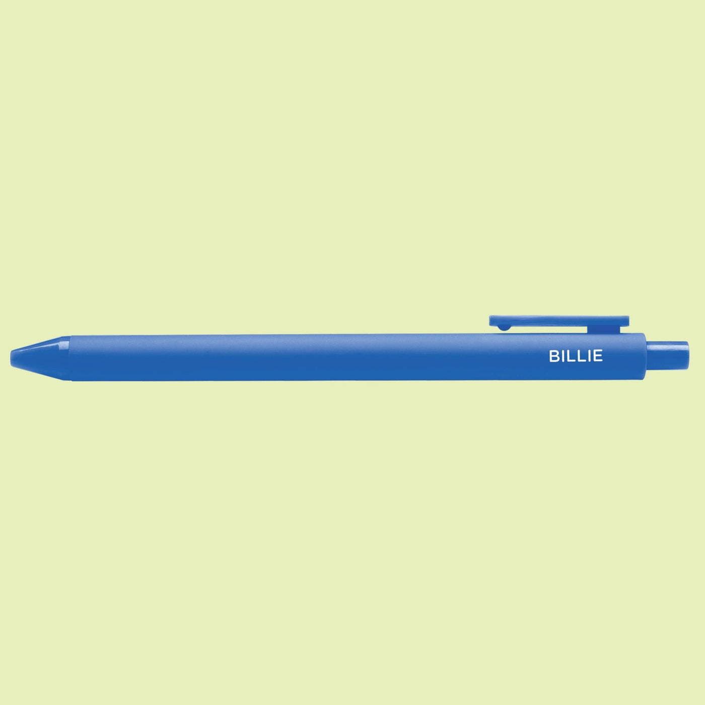 Blue pen with "Billie" text on a light green background
