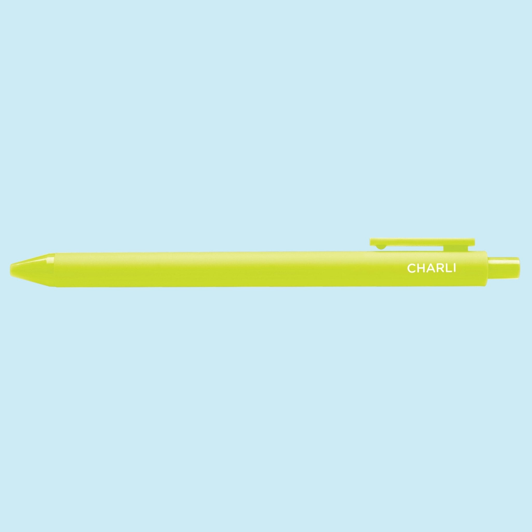 Lime green pen with 'Charli" text on a light blue background