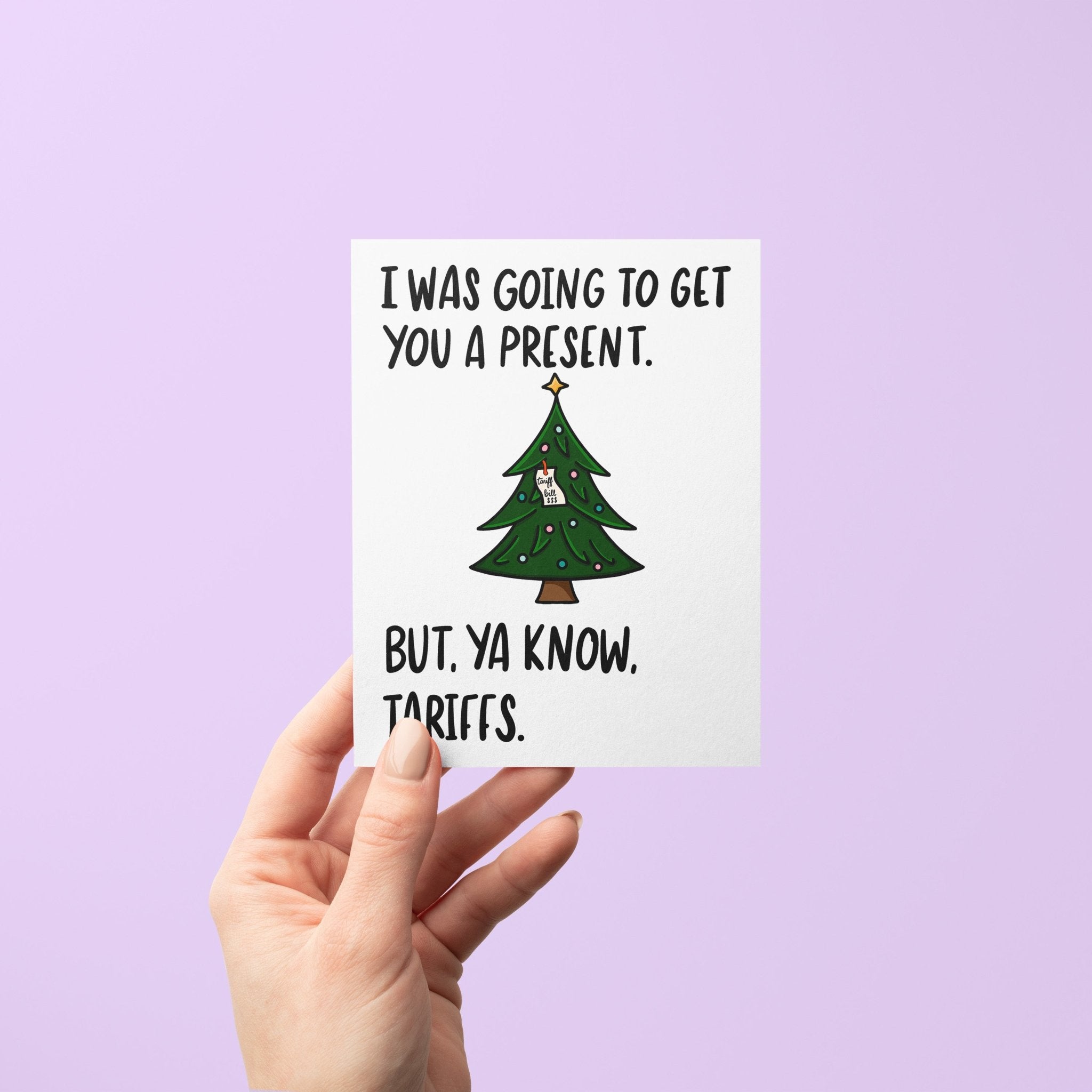 Funny Christmas card with a decorated tree and the text “I was going to get you a present. But, ya know, tariffs.”