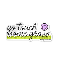 Go Touch Some Grass illustrated hand lettered vinyl sticker — hand drawn grass and smile by MangoIllustrated