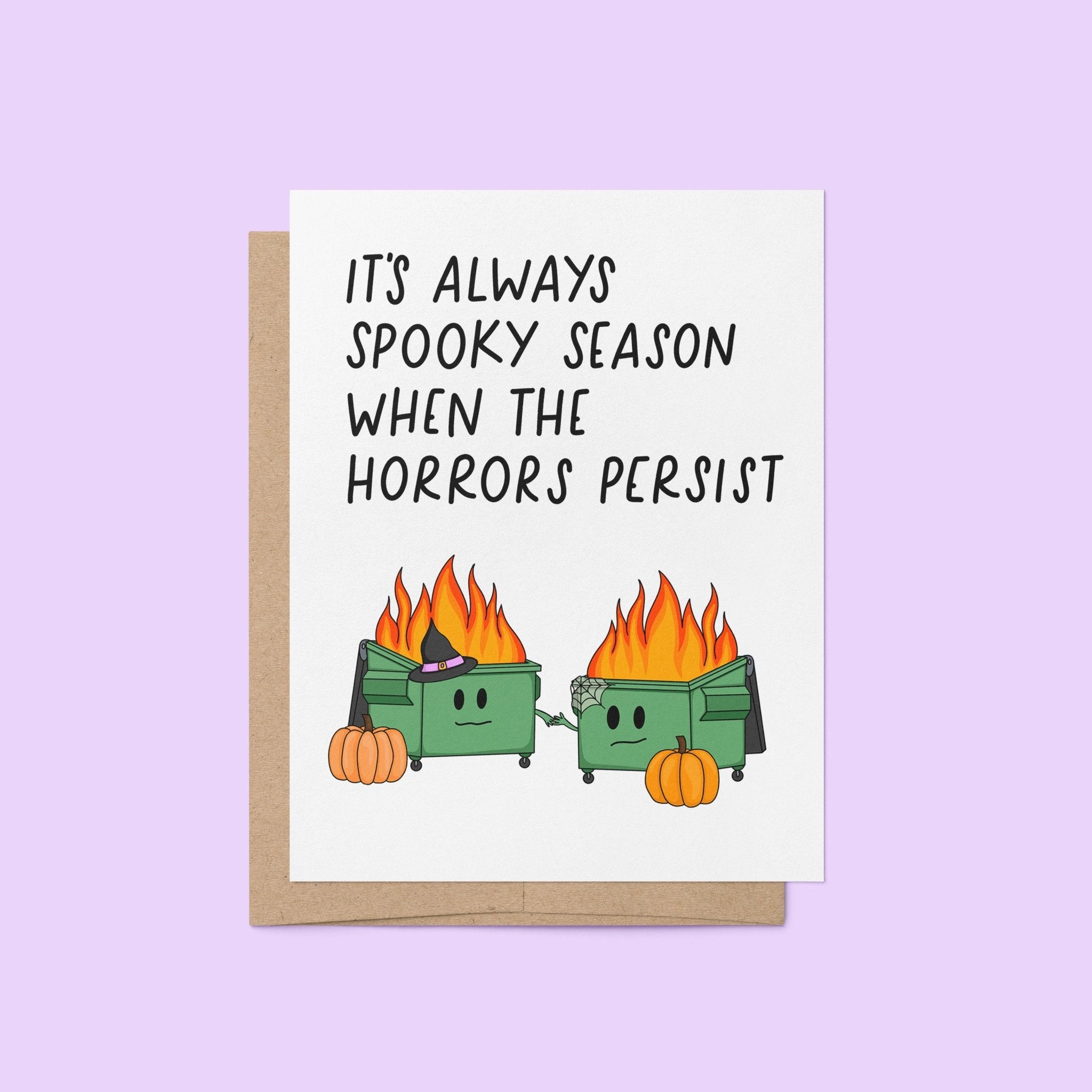 Funny Halloween card with two flaming dumpster illustrations, pumpkins, and the phrase “It’s Always Spooky Season When the Horrors Persist”