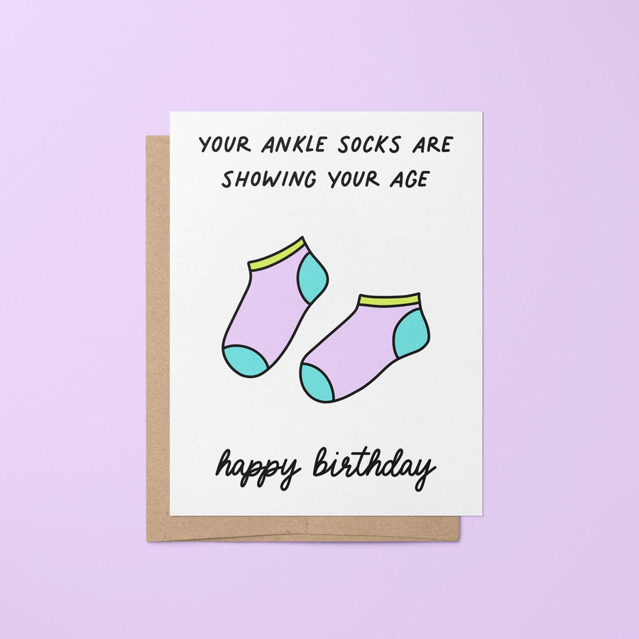 Apparently wearing ankle socks is the sign of a millennial. Who knew our socks gave away our age... Tell your millennial besties &quot;happy birthday&quot; with this &quot;your ankle socks are showing your age&quot; birthday card with an illustration of ankle socks.