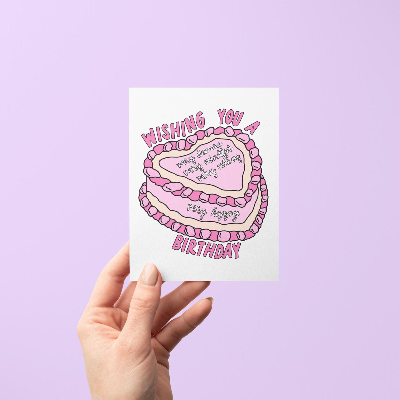 Birthdays should always be very demure, very mindful, very cutesy, and very happy. Tell your bestie &quot;happy birthday&quot; with this Very Demure birthday card featuring a pink cake illustration.