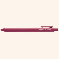 Maroon pen with 'Karma is a Cat' text on a white background