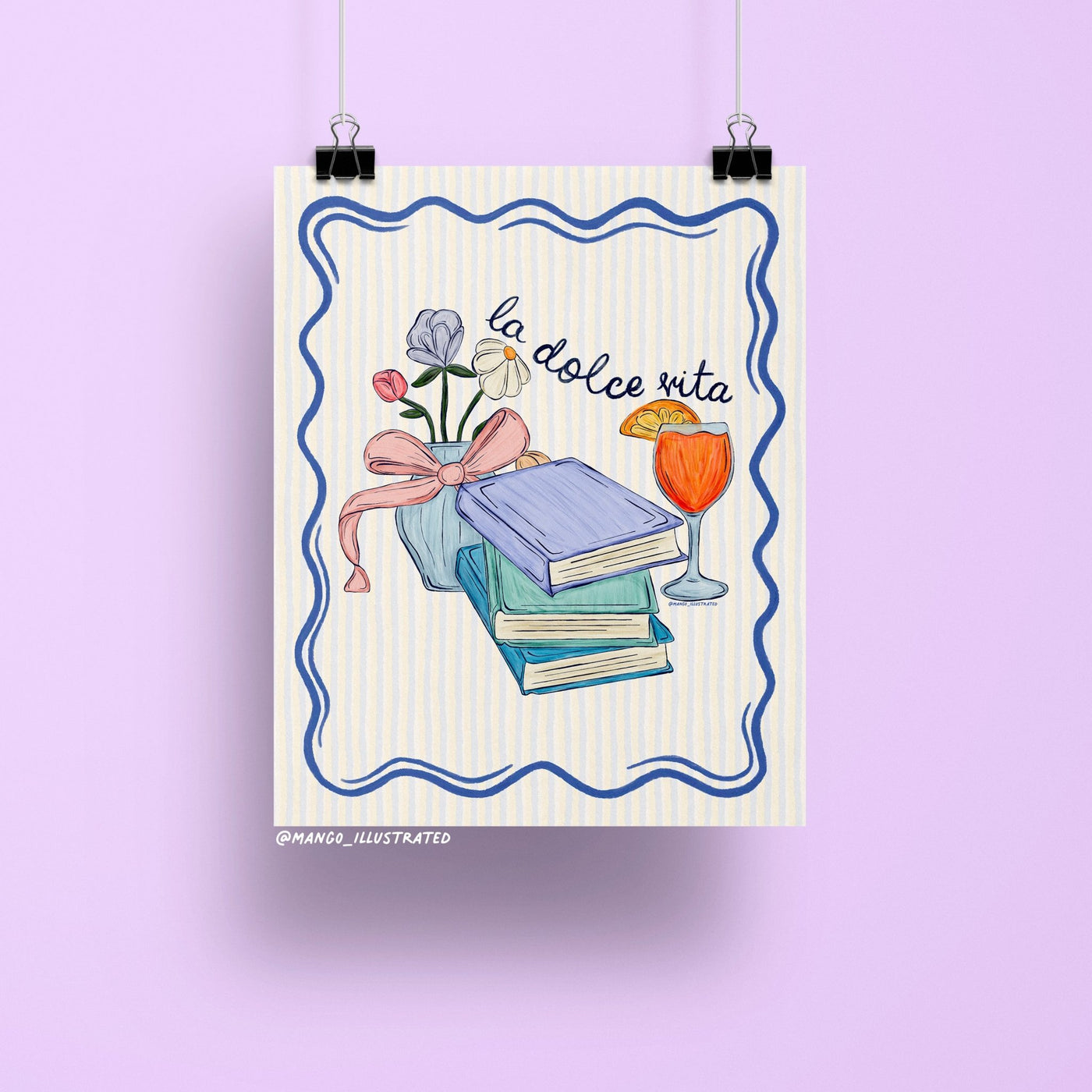 Illustrated art print featuring pastel books, a vase of flowers with a ribbon, and an Aperol spritz with the handwritten text "la dolce vita" on a striped background.