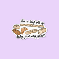“It’s a Loaf Story Baby Just Say Yeast” sticker with illustrated breads including baguette, croissant, and loaves – punny vinyl sticker for bread lovers and Swifties.