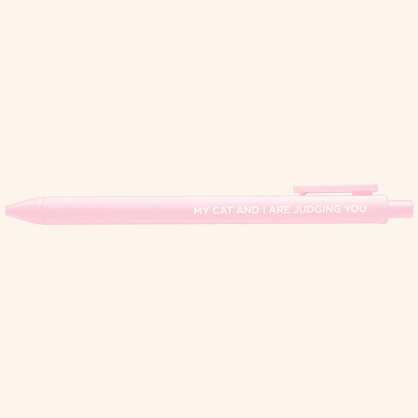 Pink pen with text on a white background