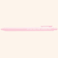Pink pen with text on a white background