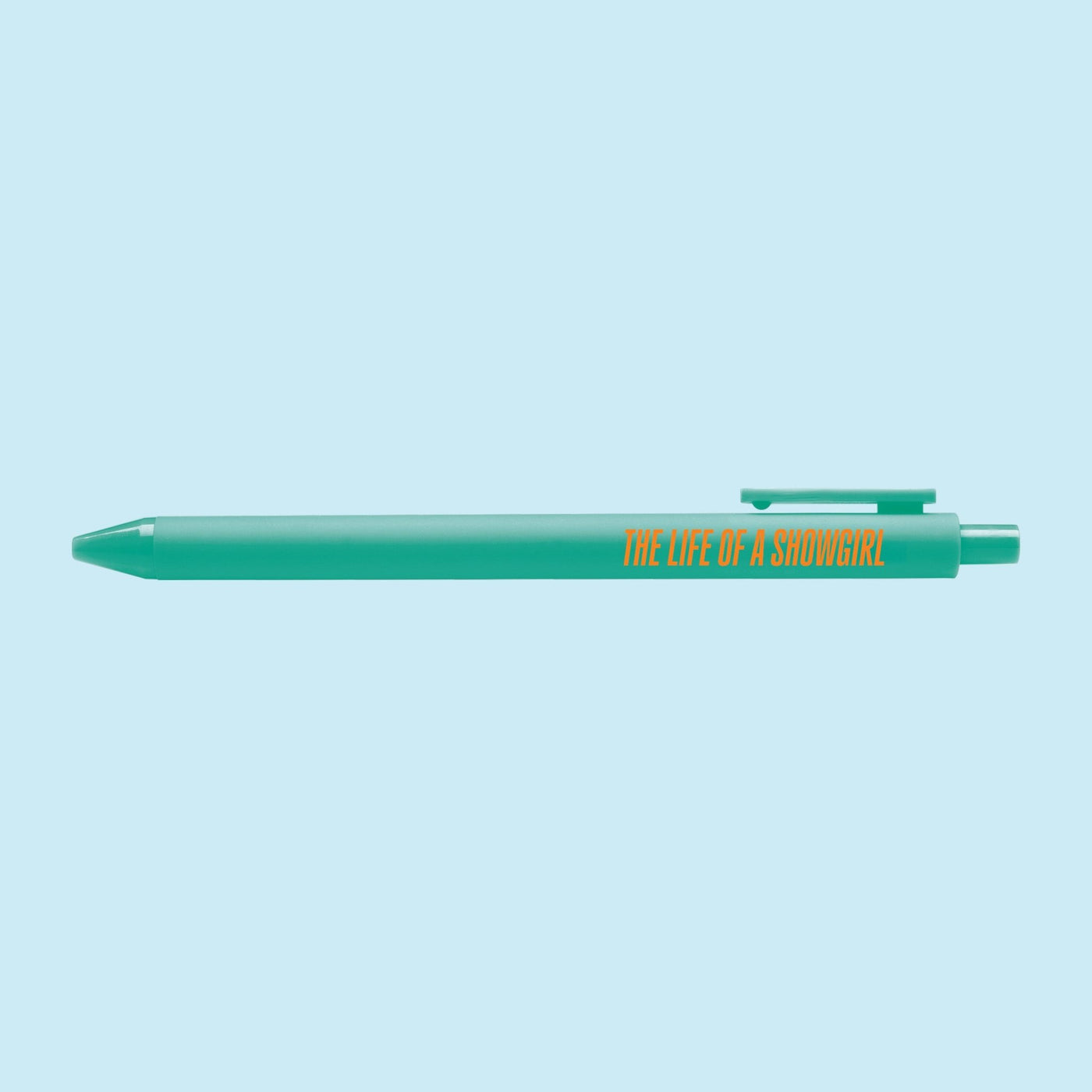 Teal pen with orange text reading "The Life of a Showgirl," pop star inspired stationery for Swifties and music lovers.