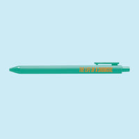 Teal pen with orange text reading "The Life of a Showgirl," pop star inspired stationery for Swifties and music lovers.