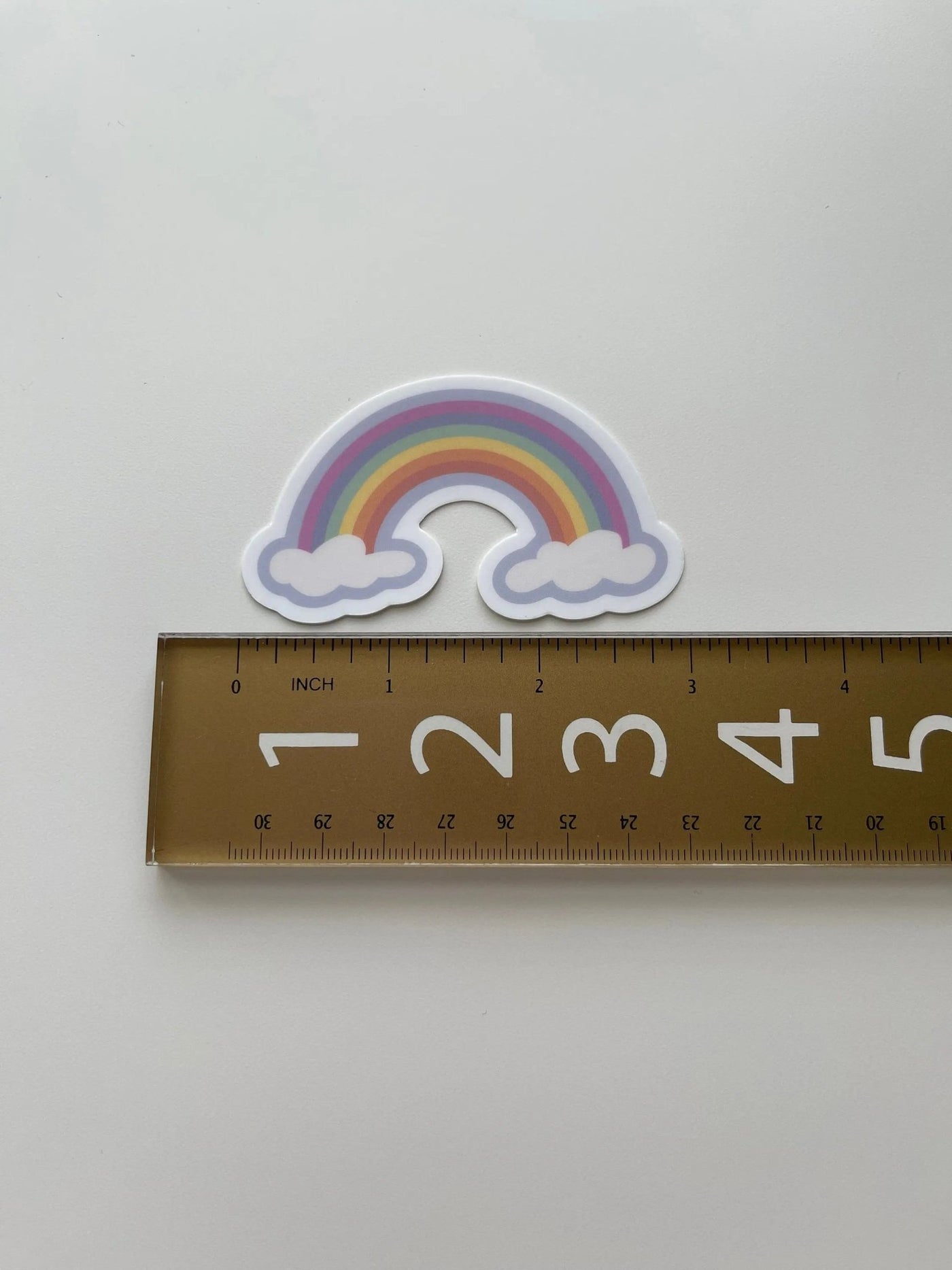 Rainbow clouds sticker - MangoIllustrated - Sticker