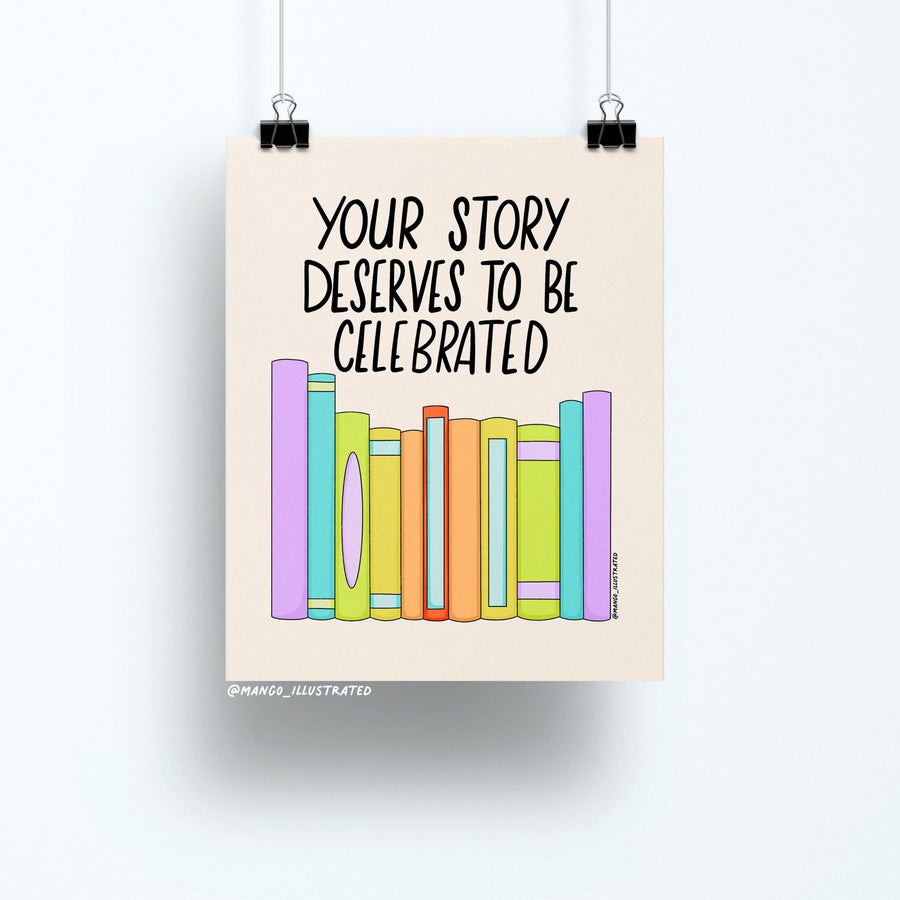 8x10 art print with the quote “Your Story Deserves to Be Celebrated” above a row of colorful pastel books on a neutral background